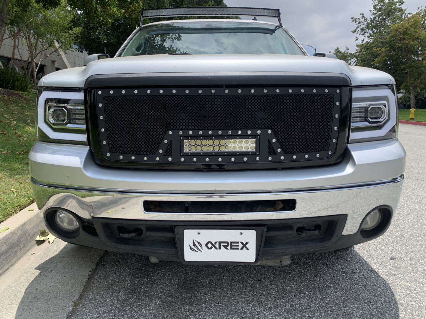 AlphaRex 07-13 GMC Sierra PRO-Series Halogen Projector Headlights Jet Black