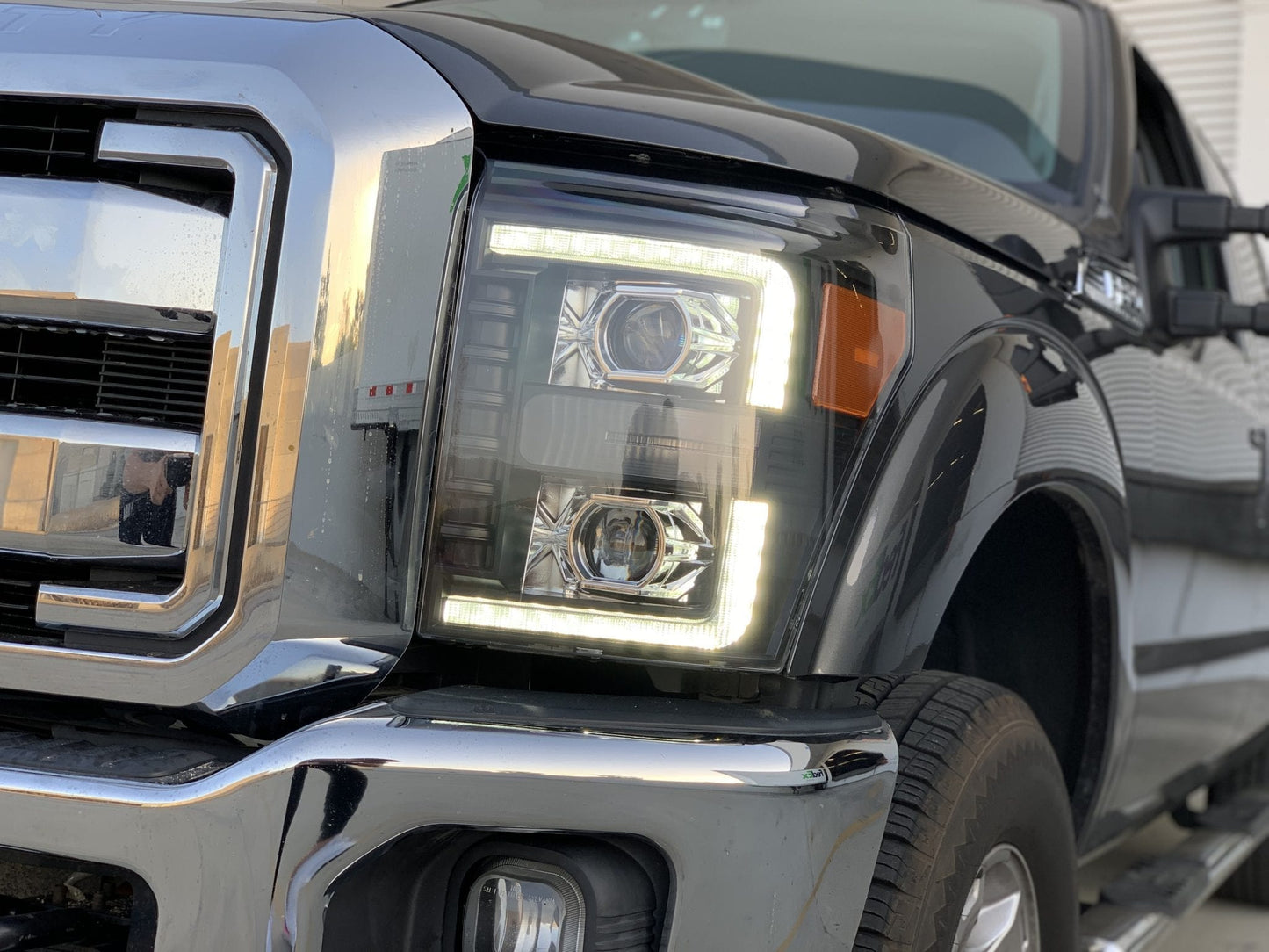 AlphaRex 11-16 Ford Super Duty PRO-Series Halogen Projector Headlights Black