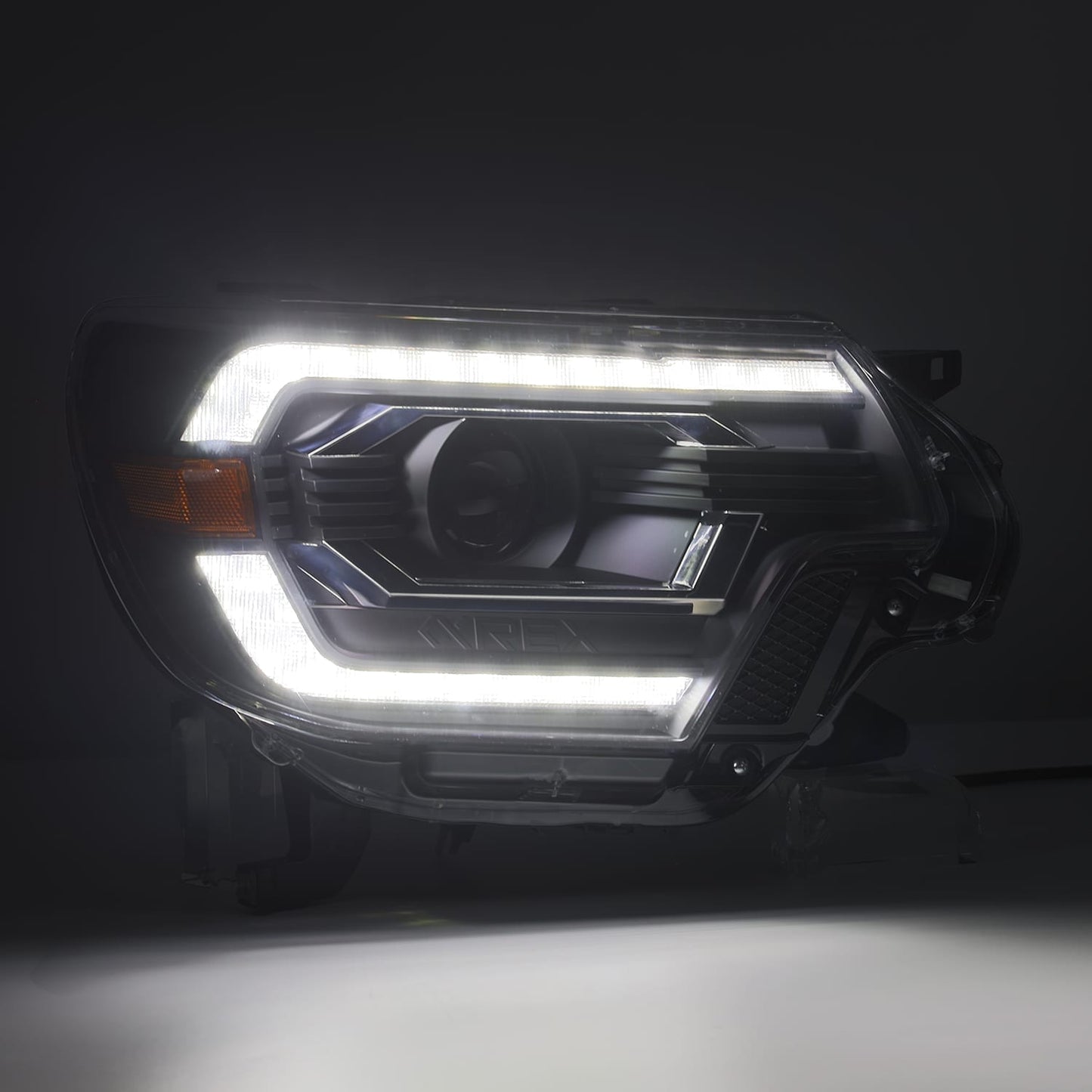 AlphaRex 12-15 Toyota Tacoma PRO-Series Halogen Projector Headlights Alpha-Black