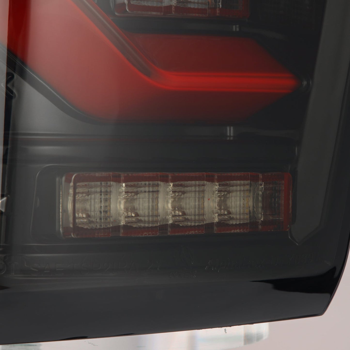 AlphaRex 16-23 Toyota Tacoma LUXX-Series LED Tail Lights Black-Red
