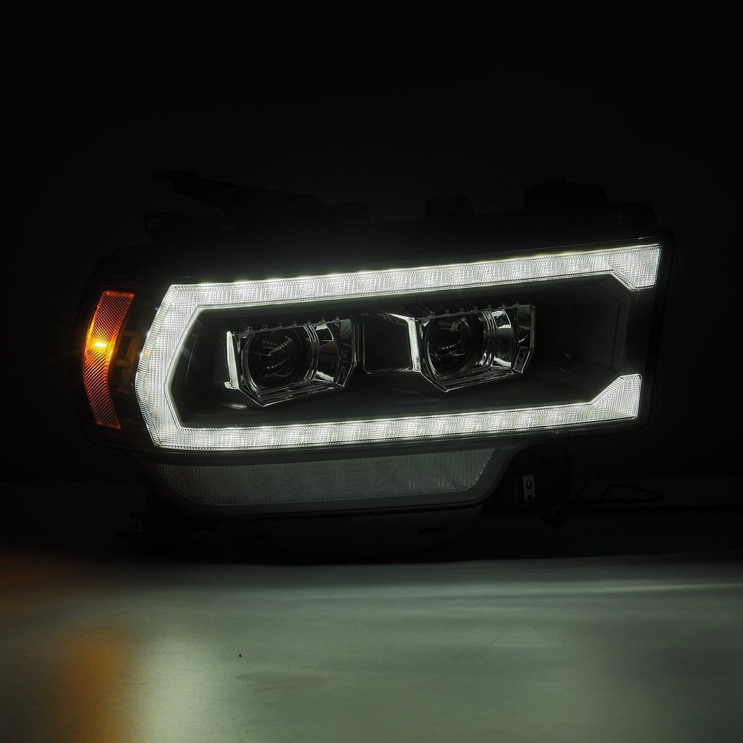 AlphaRex 19-24 Ram 2500/3500/4500/5500 PRO-Series Halogen Projector Headlights Black