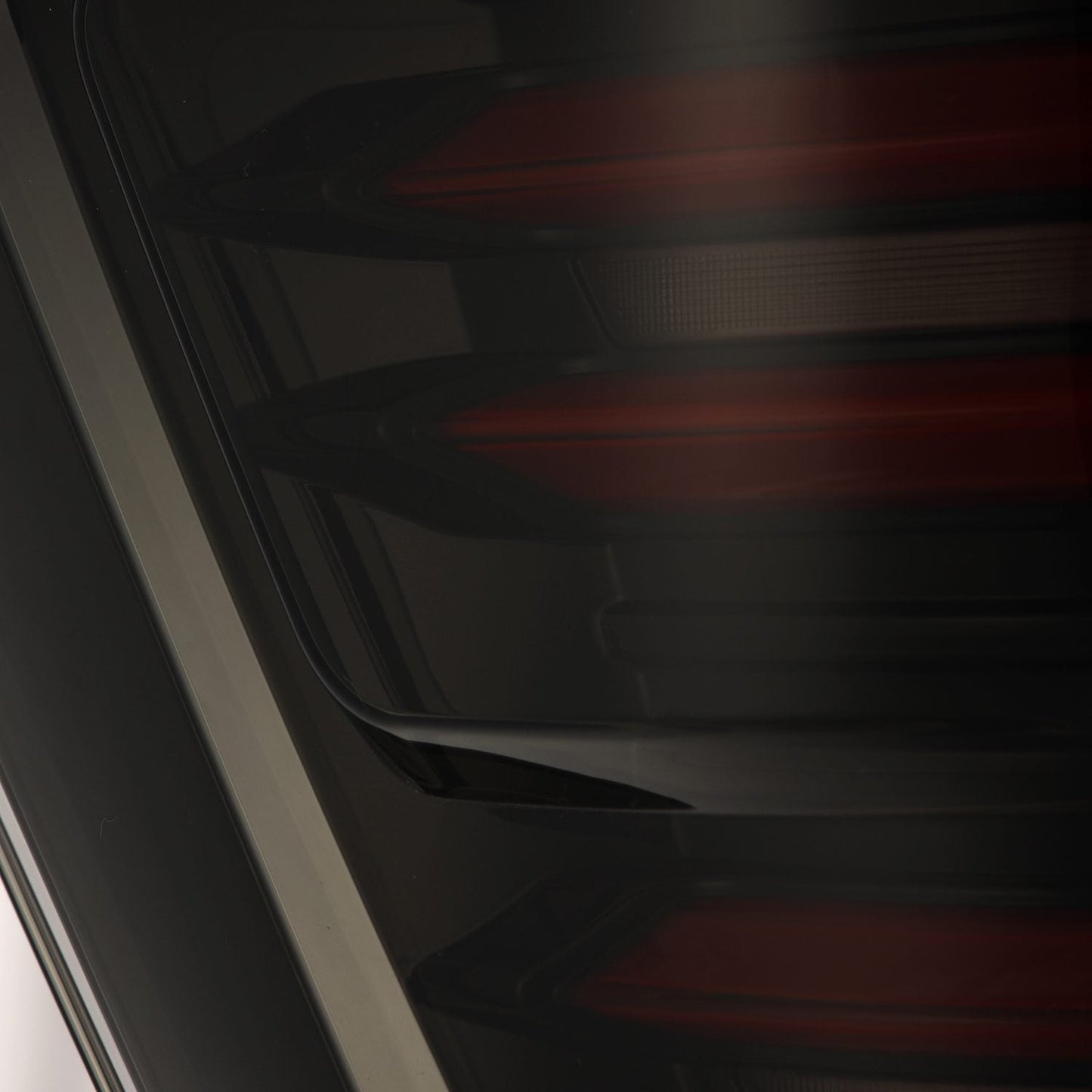AlphaRex 21-23 Ford F150/F150 Raptor LUXX-Series LED Tail Lights Black-Red
