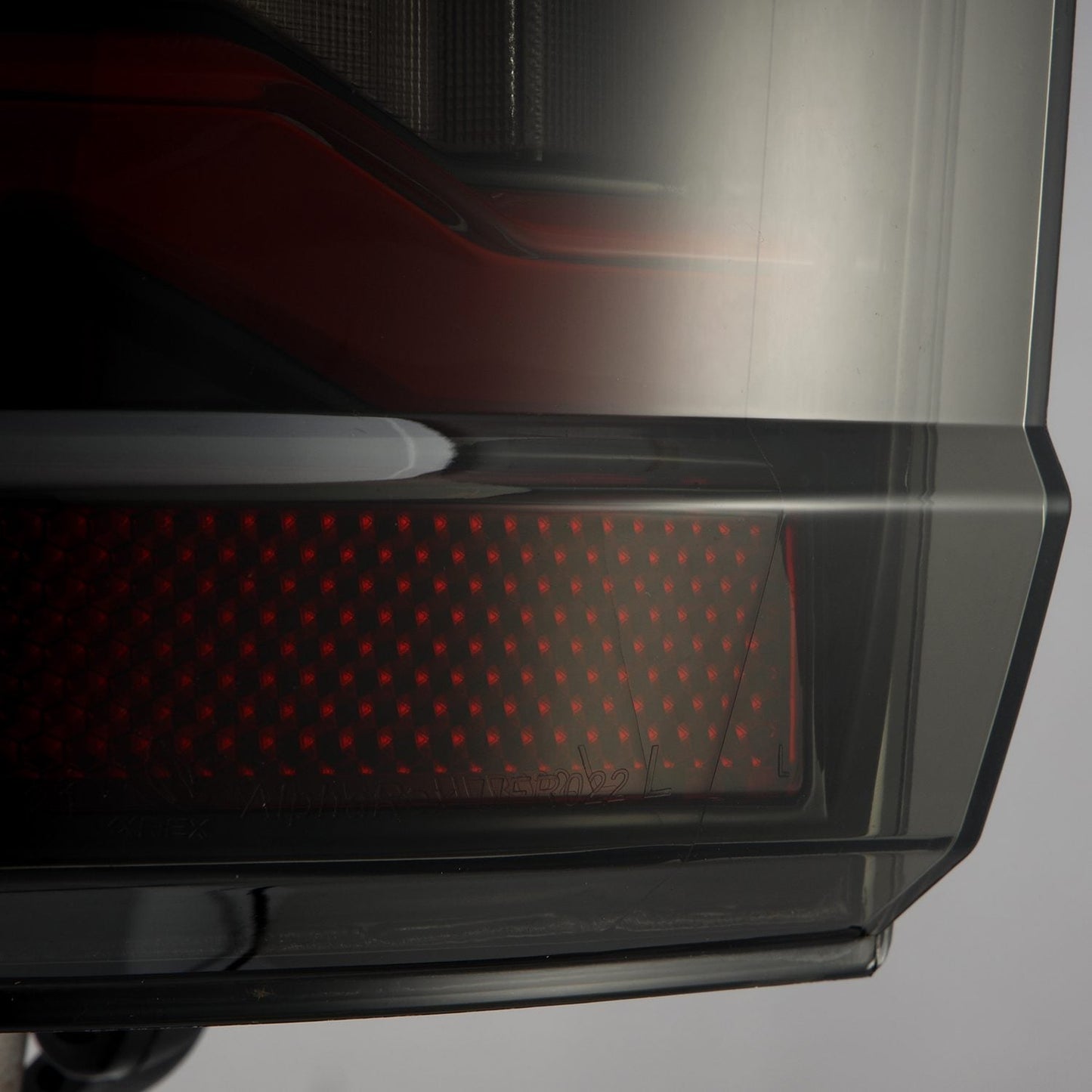 AlphaRex 21-23 Ford F150/F150 Raptor LUXX-Series LED Tail Lights Black-Red
