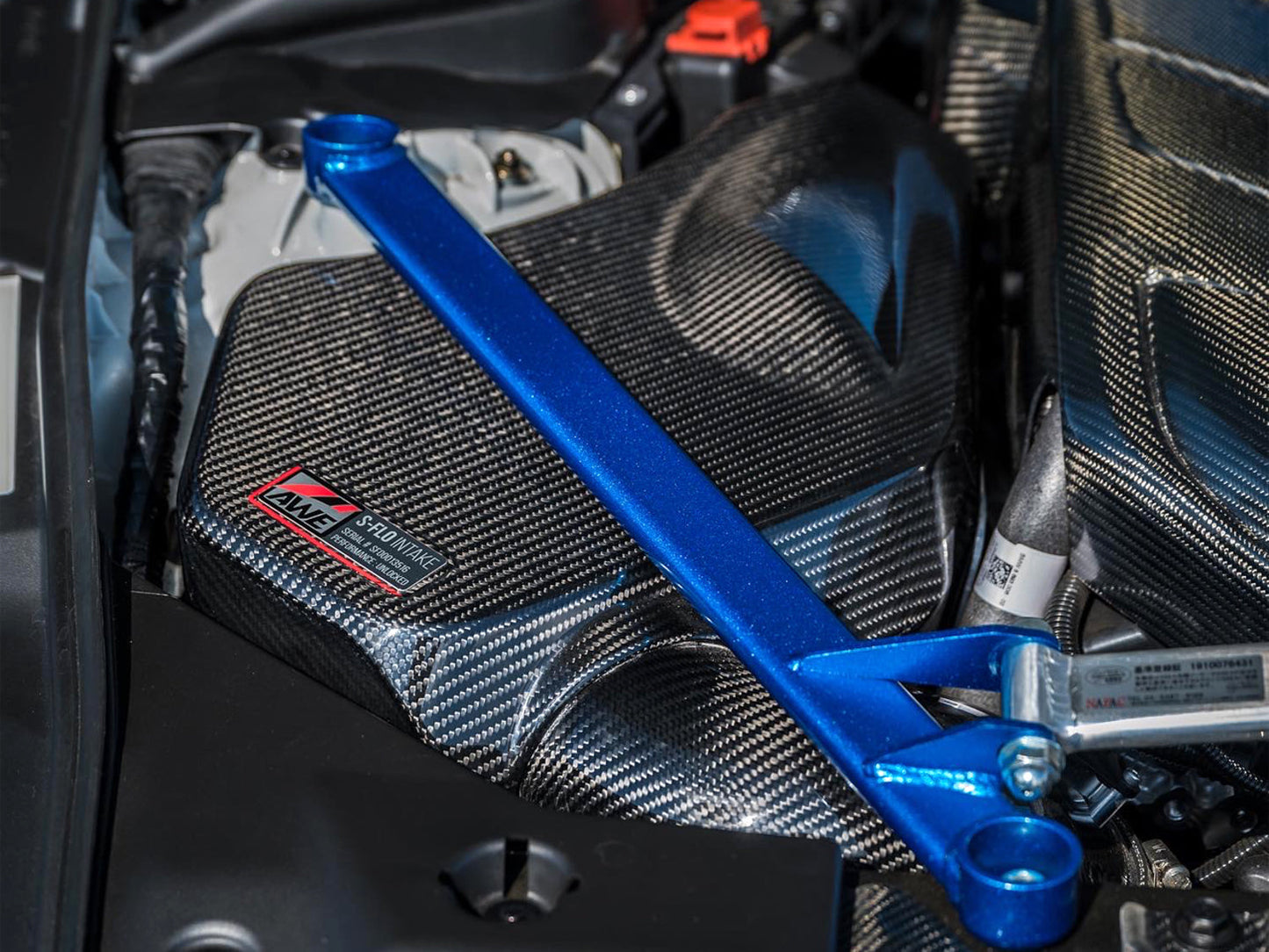 AWE Tuning S-FLO Carbon Intake Lid for 2020+ GR Supra (2660-15019)