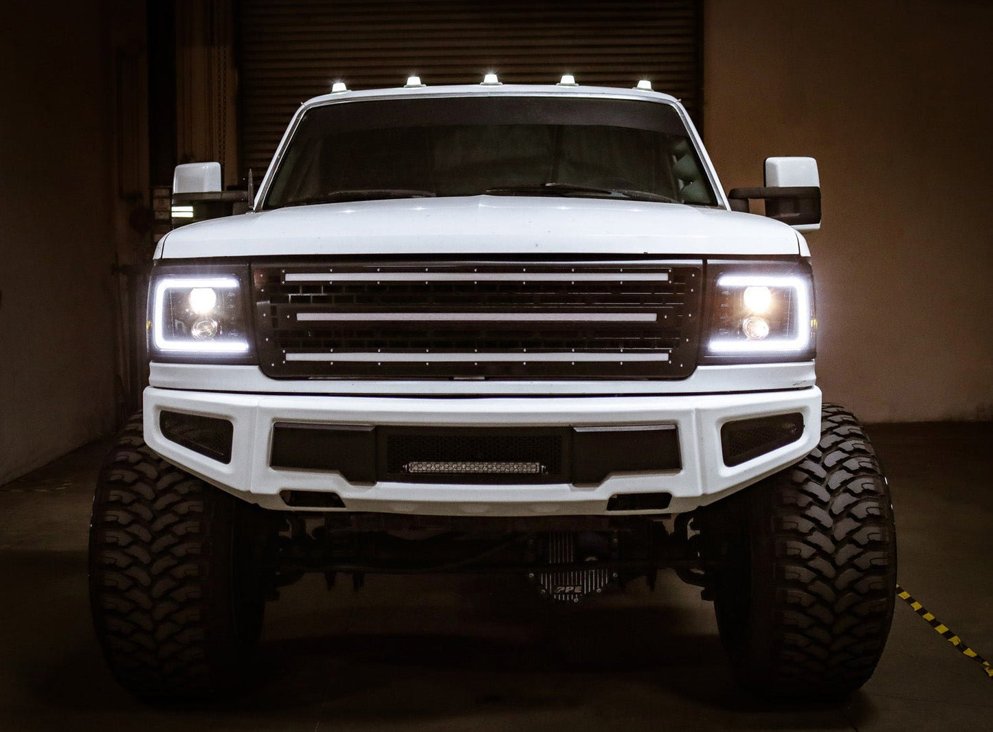 AlphaRex 92-96 Ford F-Series/Bronco PRO-Series Halogen Projector Headlights Alpha-Black