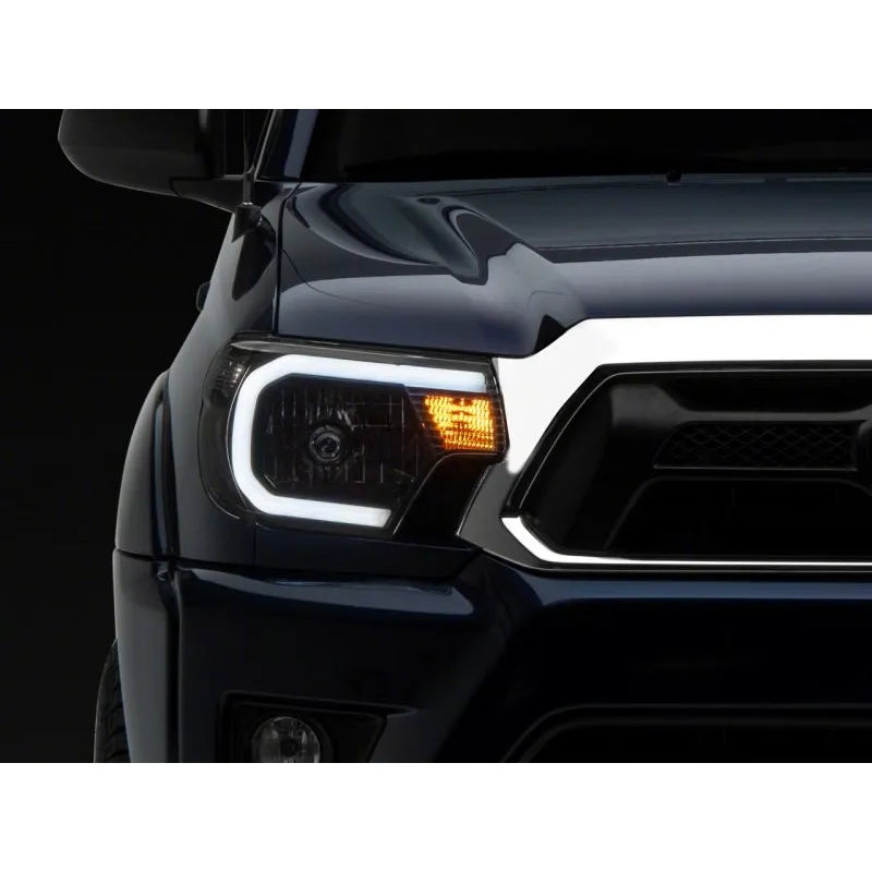 Raxiom 12-15 Toyota Tacoma Axial Headlights w/ LED Bar | Toyota Tacoma (TT21847)