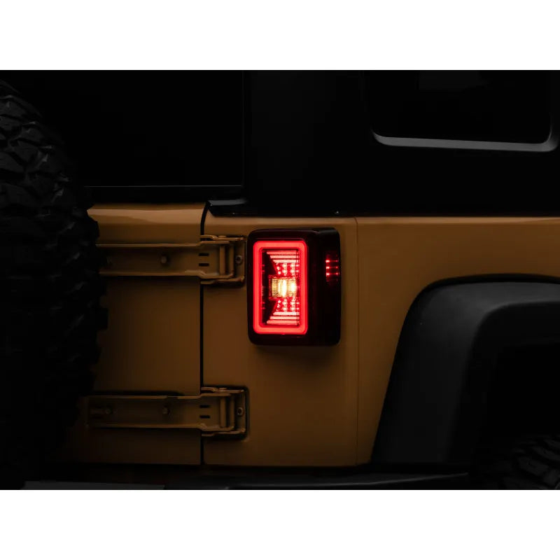 Raxiom JL Style LED Tail Lights Black Housing Red Lens Jeep Wrangler JK (J133626)