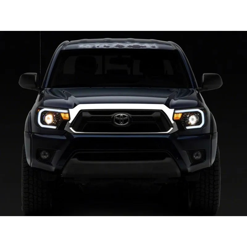 Raxiom 12-15 Toyota Tacoma Axial Series Projector Headlights w/ LED Bar | Tacoma (TT21849)