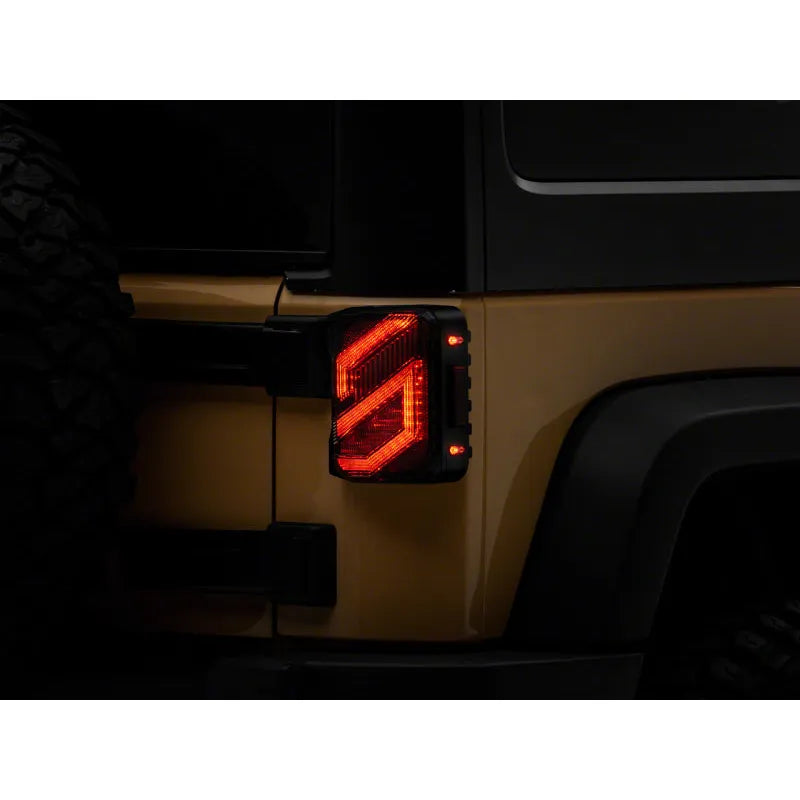 Raxiom 07-18 Jeep Wrangler JK Axial Trident LED Tail Lights | Black/Clear (J173719)