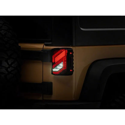 Raxiom 07-18 Jeep Wrangler JK Axial Trident LED Tail Lights | Black/Clear (J173719)