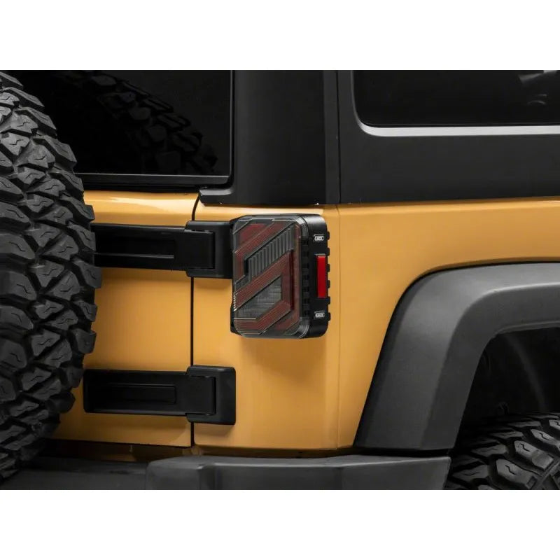 Raxiom 07-18 Jeep Wrangler JK Axial Trident LED Tail Lights | Black/Clear (J173719)