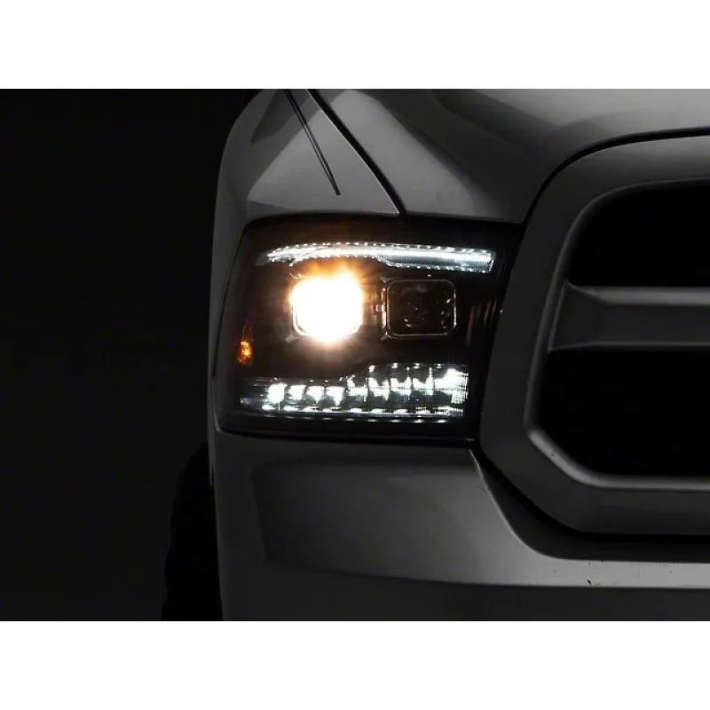 Raxiom 09-18 RAM 1500 LED Projector Headlights w/ Switchback | RAM 1500 (R111520)