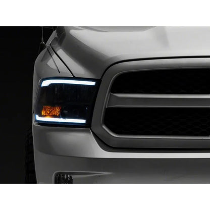 Raxiom 09-18 Dodge RAM Axial Headlights w/ LED Bar | 2009-2018 (R131481)