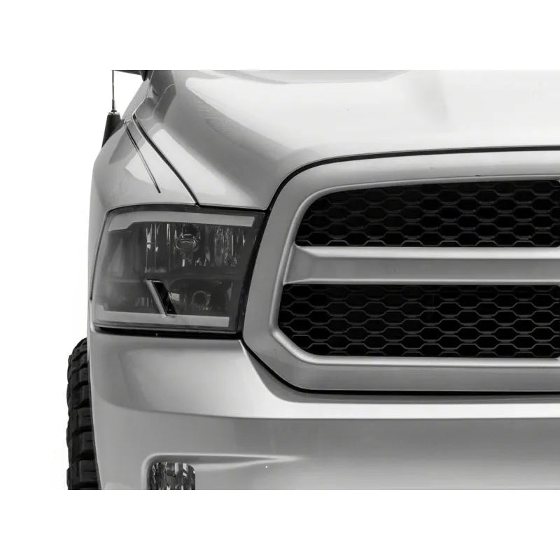 Raxiom 09-18 Dodge RAM Axial Headlights w/ LED Bar | 2009-2018 (R131481)