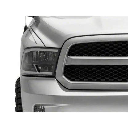 Raxiom 09-18 Dodge RAM Axial Headlights w/ LED Bar | 2009-2018 (R131481)