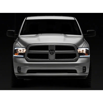 Raxiom 09-18 Dodge RAM Axial Headlights w/ LED Bar | 2009-2018 (R131481)