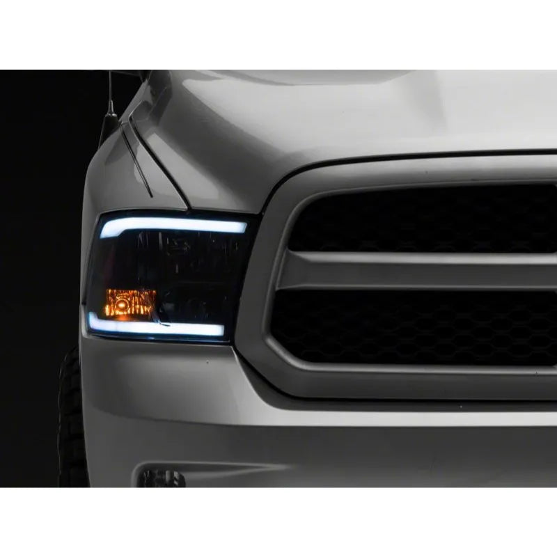 Raxiom 09-18 Dodge RAM Axial Headlights w/ SEQL LED Bar | RAM 1500/2500/3500 (R131482)