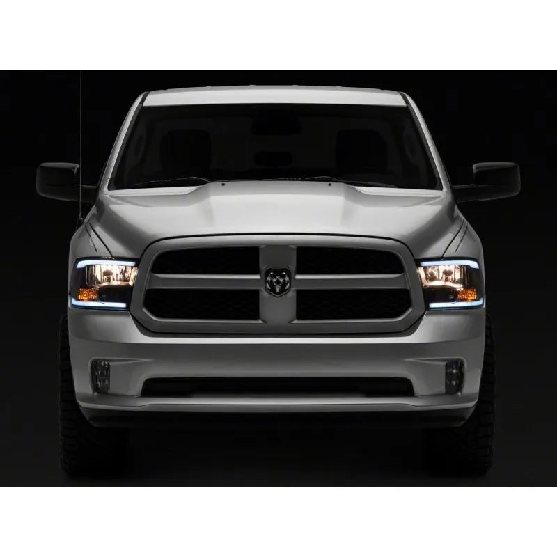 Raxiom 09-18 Dodge RAM Axial Headlights w/ SEQL LED Bar | RAM 1500/2500/3500 (R131482)