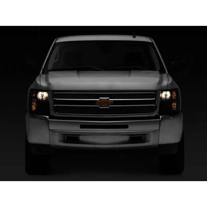 Raxiom 07-14 Chevy Silverado 1500 HD OEM Axial | Smoked Lens / Chrome Housing (S122324)