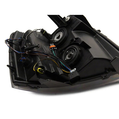 Raxiom 07-13 Chevy Silverado Axial Headlights w/ LED Bar- Black (S138003)
