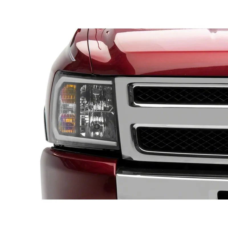 Raxiom 07-13 Chevy Silverado Axial Headlights w/ LED Bar- Black (S138003)