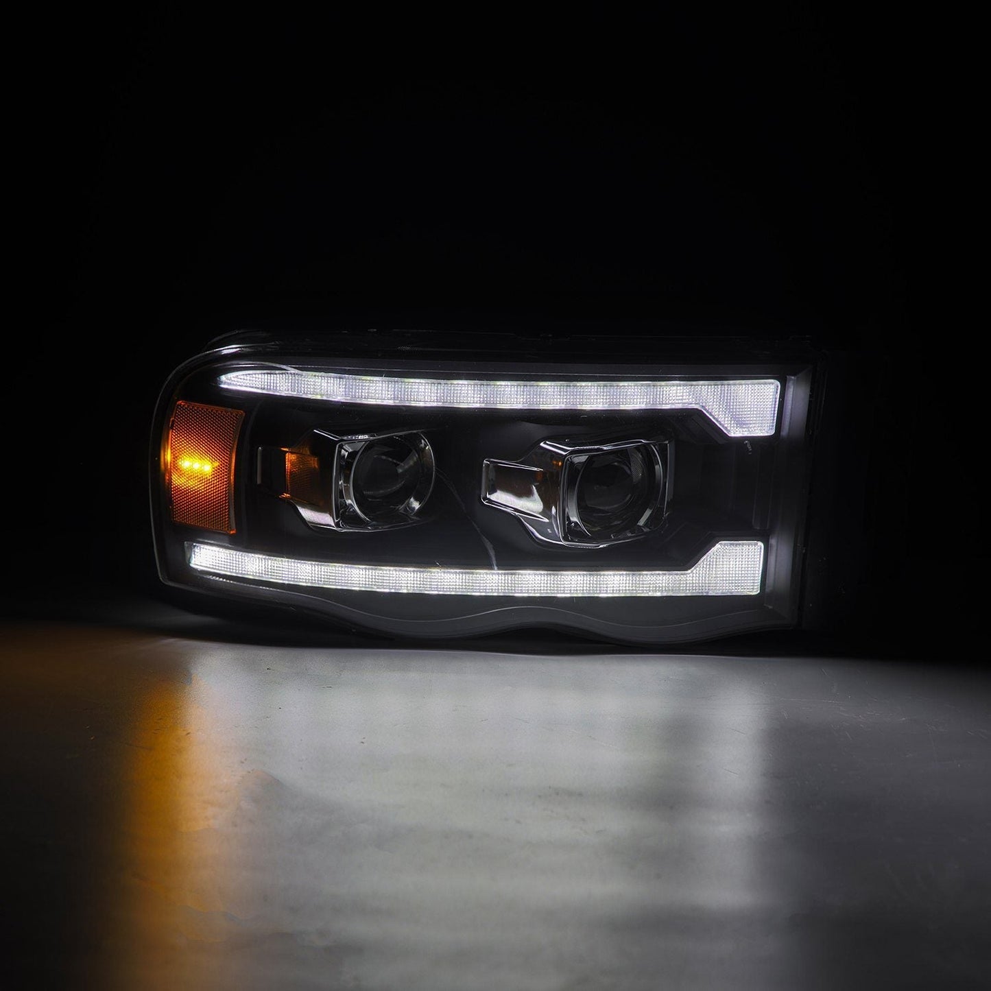 AlphaRex 02-05 Dodge Ram PRO-Series Halogen Projector Headlights Black