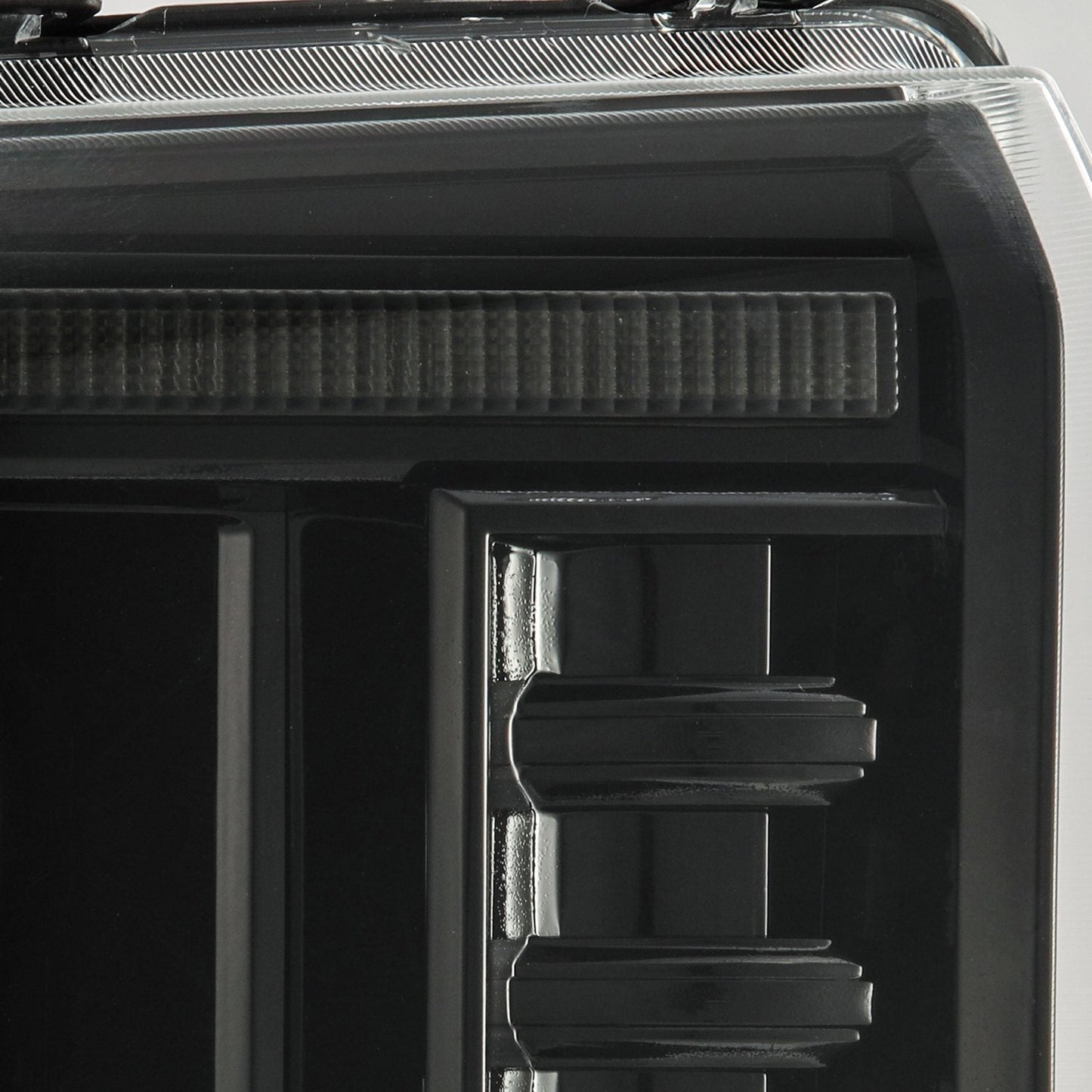 AlphaRex 05-07 Ford Super Duty/Excursion LUXX-Series LED Projector Headlights Alpha-Black