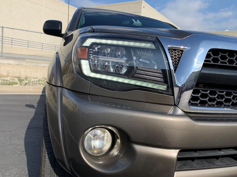AlphaRex 05-11 Toyota Tacoma LUXX Crystal Headlights Plank Style Design Black w/Activation Light/DRL