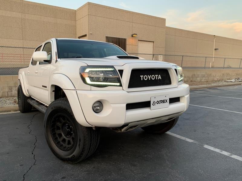 AlphaRex 05-11 Toyota Tacoma LUXX Crystal Headlights Plank Style Design Black w/Activation Light/DRL
