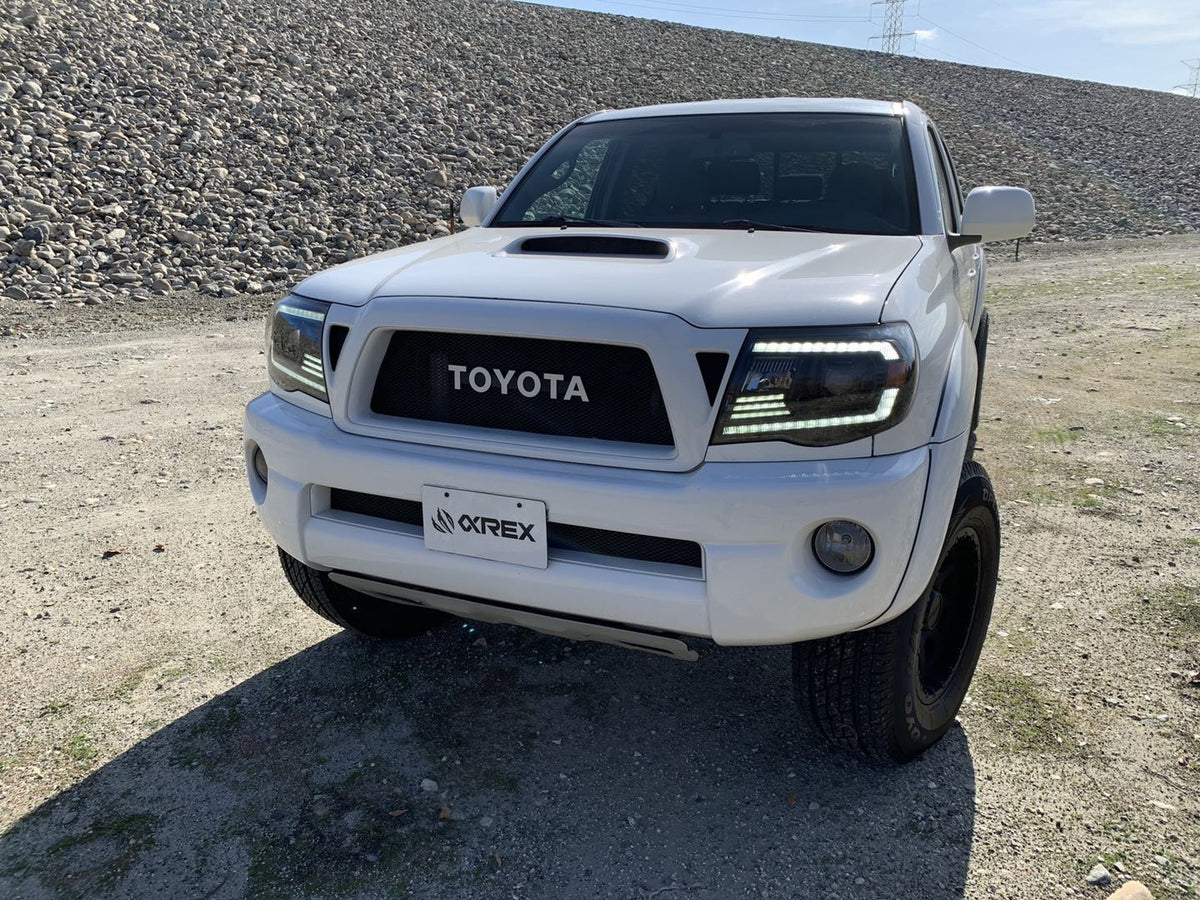 AlphaRex 05-11 Toyota Tacoma PRO-Series Projector Headlights Plank Style Design Black w/DRL