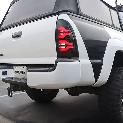 AlphaRex 05-15 Toyota Tacoma LUXX-Series LED Tail Lights Black