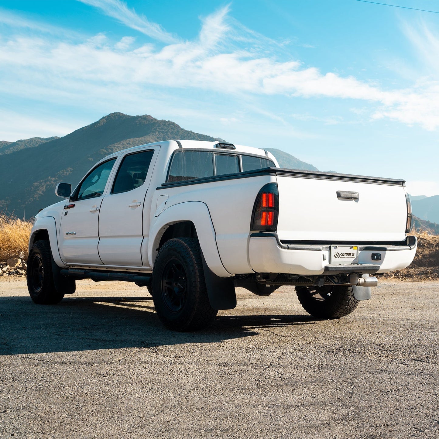 AlphaRex 05-15 Toyota Tacoma NOVA-Series Prismatic LED Tail Lights Alpha-Black