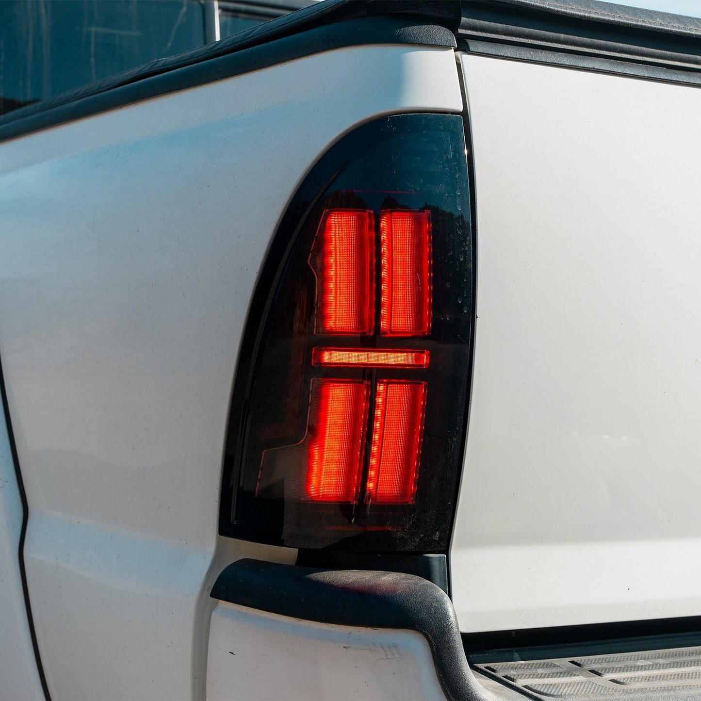 AlphaRex 05-15 Toyota Tacoma NOVA-Series Prismatic LED Tail Lights Alpha-Black