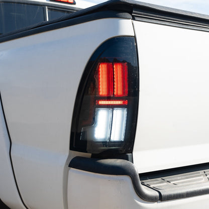 AlphaRex 05-15 Toyota Tacoma NOVA-Series Prismatic LED Tail Lights Black