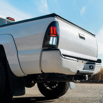 AlphaRex 05-15 Toyota Tacoma NOVA-Series Prismatic LED Tail Lights Black