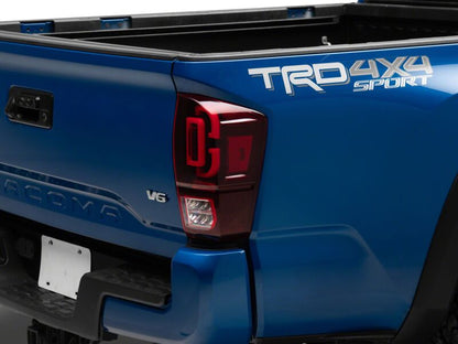 Raxiom 16-23 Toyota Tacoma XW Seq LED Tail Lights Black Housing Red Lens (TT30332)