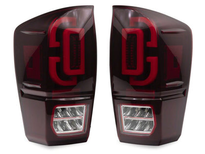 Raxiom 16-23 Toyota Tacoma XW Seq LED Tail Lights Black Housing Red Lens (TT30332)