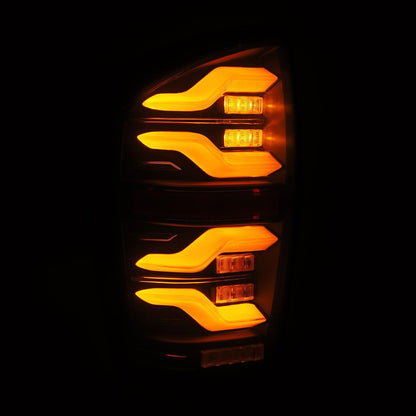 AlphaRex 16-23 Toyota Tacoma LUXX-Series LED Tail Lights Black