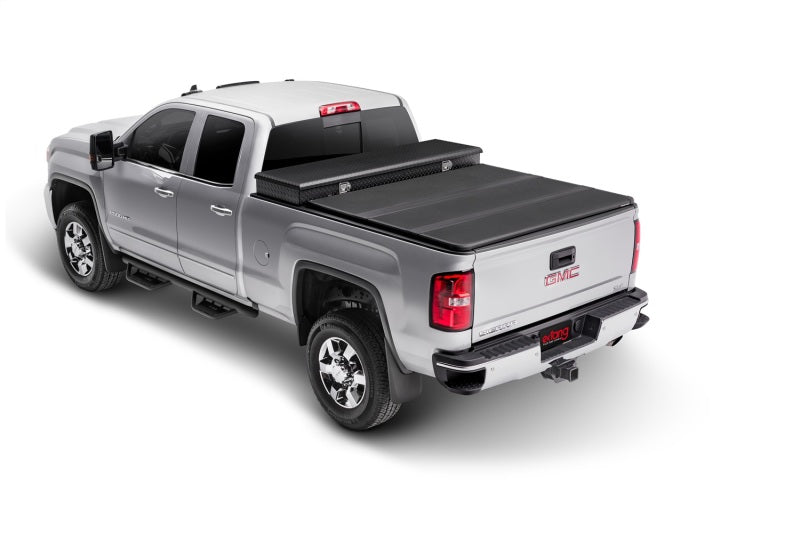 Extang 84653 Solid Fold 2.0 Tool Box Tonneau Cover For 20-26 Silverado/Sierra HD