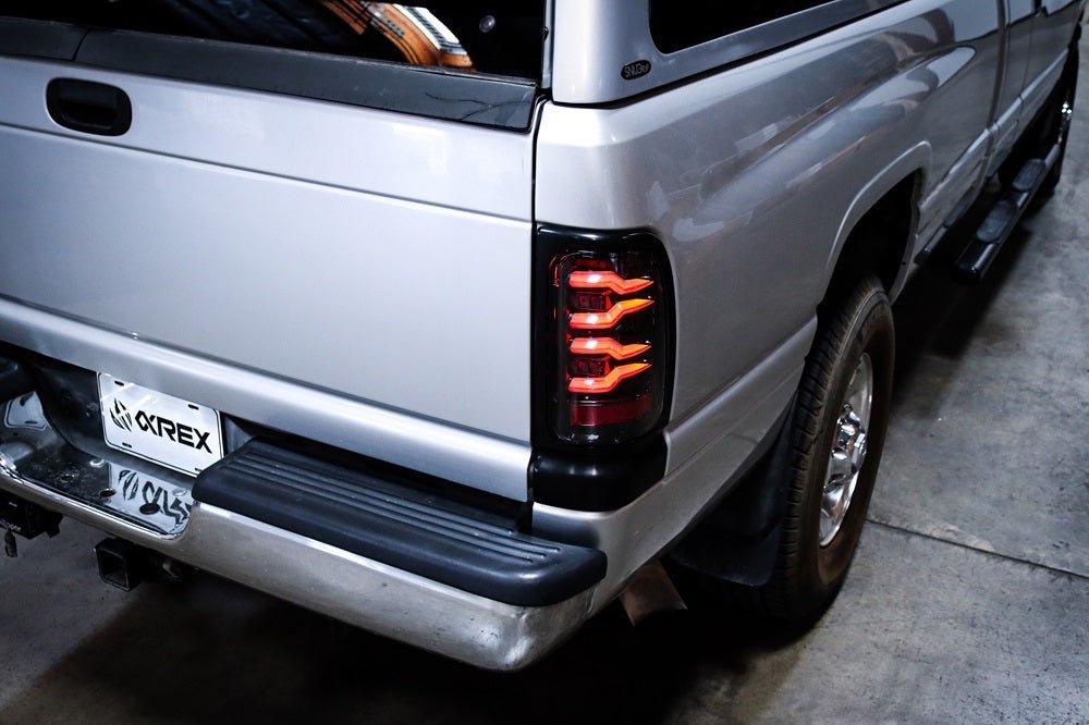 AlphaRex 94-01 Dodge Ram 1500/2500/3500 LUXX-Series LED Tail Lights - Black/Red