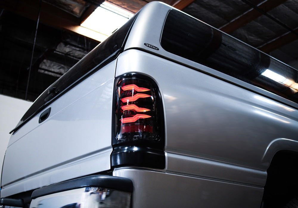 AlphaRex 94-01 Dodge Ram 1500/2500/3500 LUXX-Series LED Tail Lights - Black/Red
