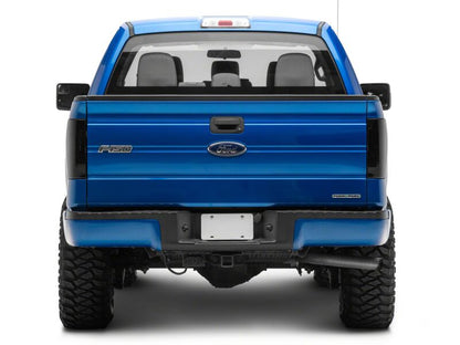 Raxiom 09-14 Ford F-150 Styleside Axial LED Tail Lights Black Housing Smoked Lens (T582534)