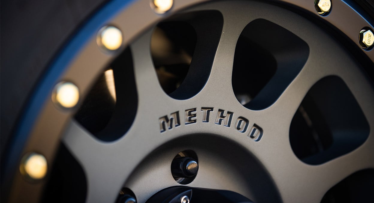 (set of 4) Method MR305 NV Titanium - Matte Black Lip | 18x9" +18mm | 6x135mm Wheel