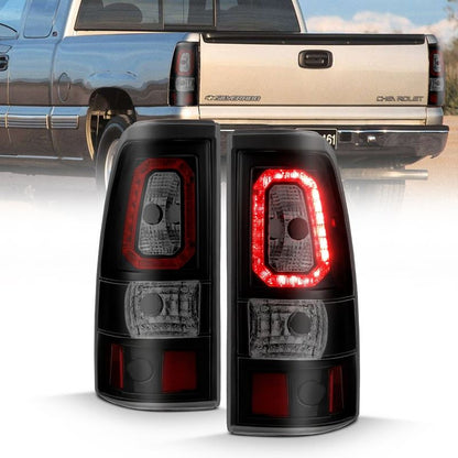 ANZO LED Tail Light Assembly w/ Smoke Lens Black Housing Pair | Chevy Silverado 1500 (99-02) (311325)