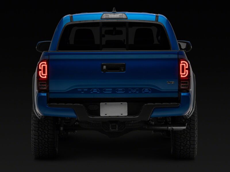 Raxiom 16-23 Toyota Tacoma XW Seq LED Tail Lights Black Housing Red Lens (TT30332)