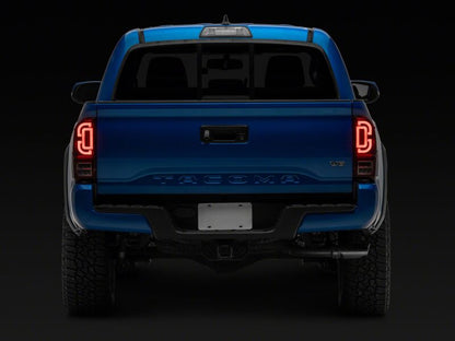 Raxiom 16-23 Toyota Tacoma XW Seq LED Tail Lights Black Housing Red Lens (TT30332)
