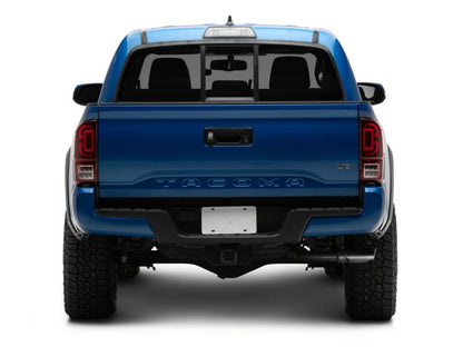 Raxiom 16-23 Toyota Tacoma XW Seq LED Tail Lights Black Housing Red Lens (TT30332)