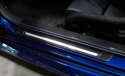 Revel GT Dry Carbon Door Sill Covers | 2022+ Subaru BRZ / Toyota GR86